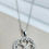 Thumbnail: Silver Rhinestone Halo Shamrock Necklace