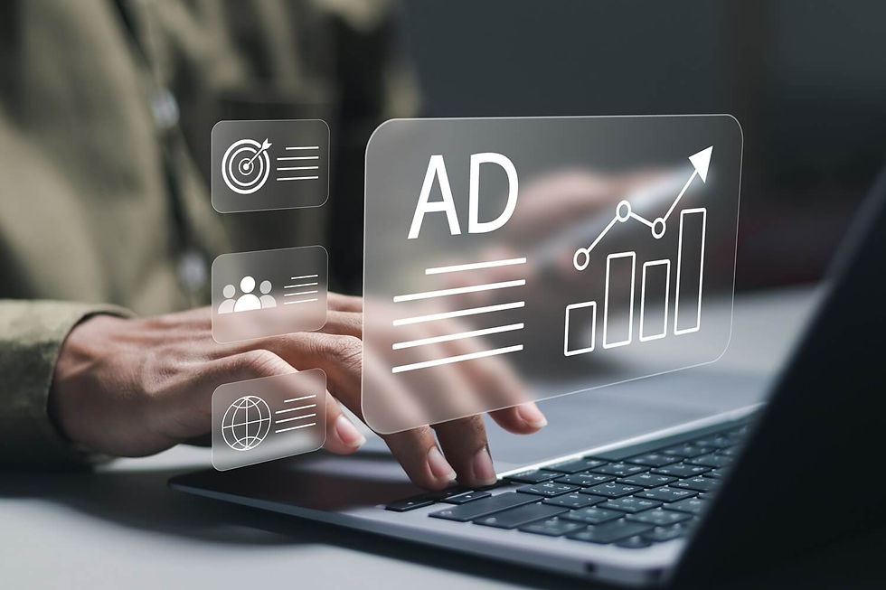 Hands typing on a laptop with glowing icons of a target, people, globe, and text "AD" with a graph. Background is blurred, focused on tech.