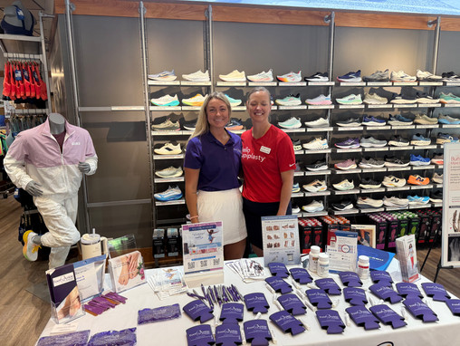 Dr. Kaldenberg and Dr. Dayton meeting with runners at Fleet Feet in Des Moines.