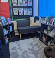 Sofa and bookshelf in the reading area