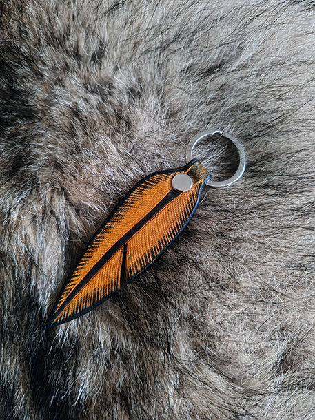 Miniature : porte clé en cuir plume jaune