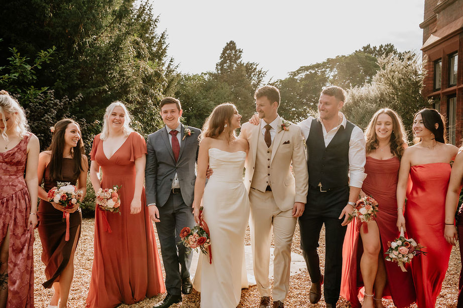 bridal party walking happy, candid wedding photography
