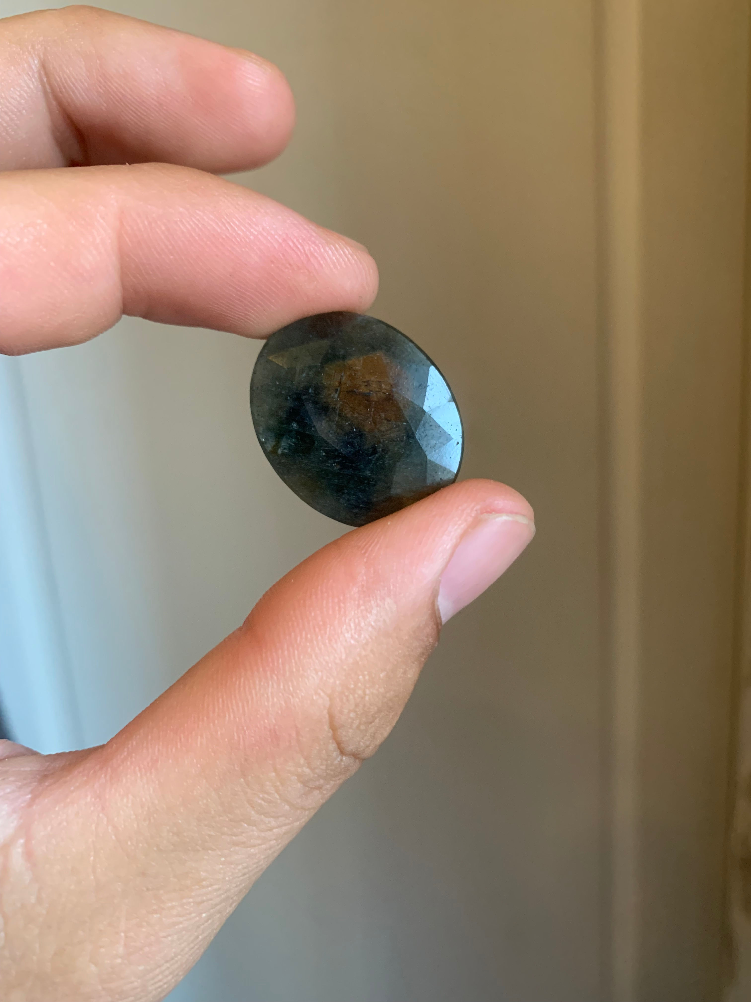 30.20ct Oval thin Green Sapphire with Gold Centre