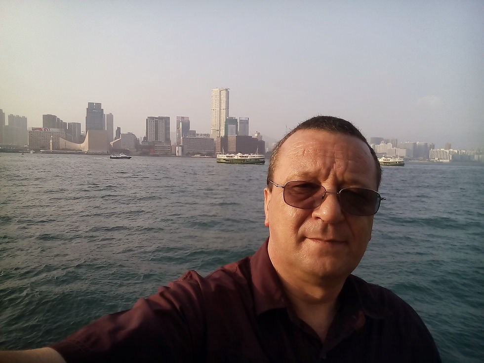 Man in sunglasses with city skyline background