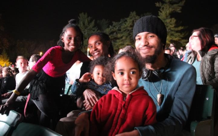 Sean Proctor, 27 and his partner Yonique Myrie, 25 brought their family to see Katy Perry. The believe Hillary Clinton is the lesser of two evils in an election where there is no good candidate. CREDIT: RUTH SHERLOCK/THE TELEGRAPH