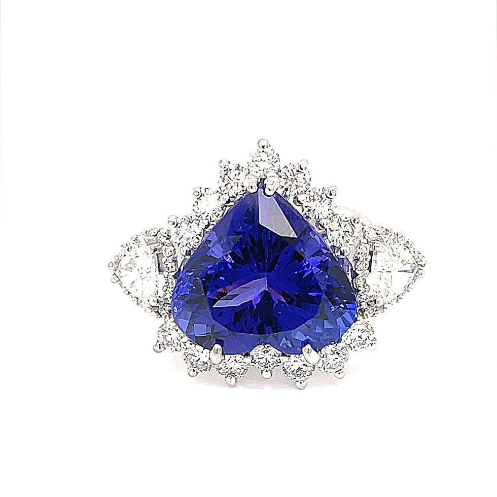 Thumbnail: Heart shaped Tanzanite and Diamond Halo Ring