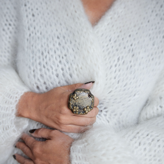 woman in a white angora sweater.