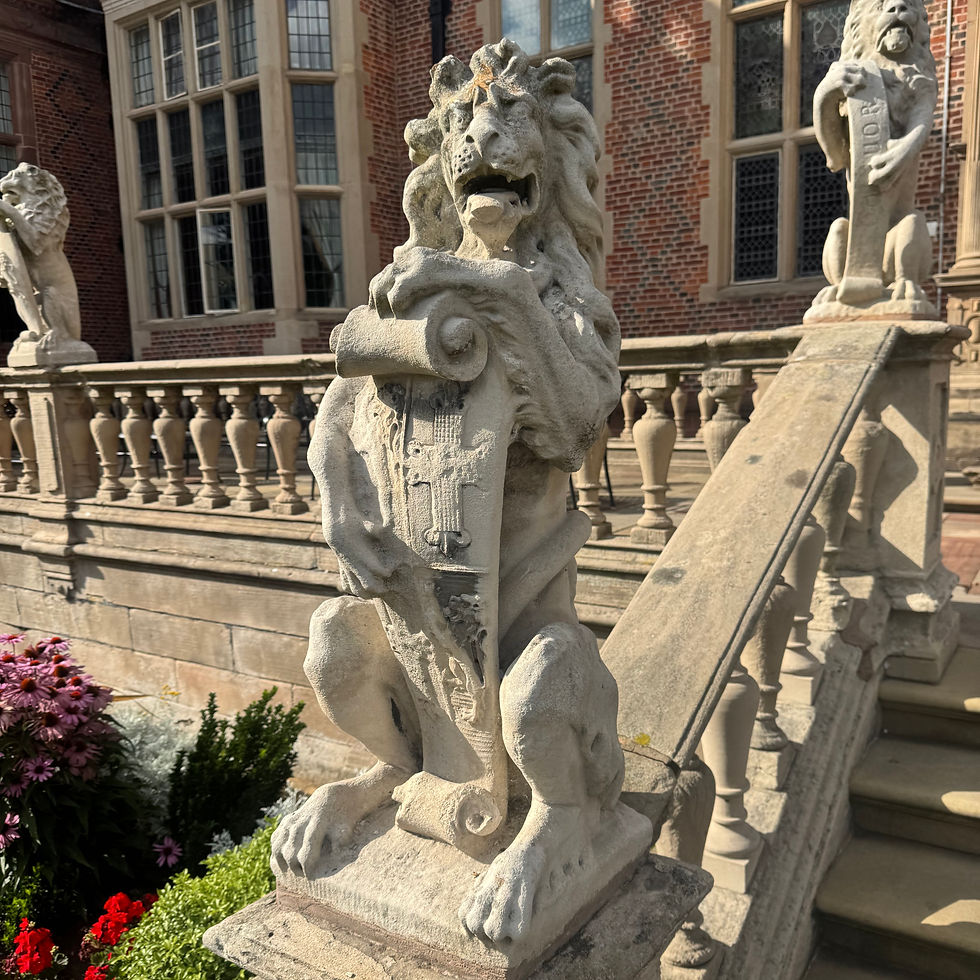 “Lion statues welcoming me to my humble servant’s quarters.”