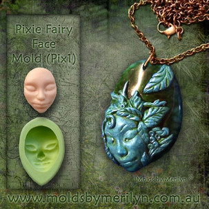 Wild woman pendant in polymer clay using a silicone mold face.