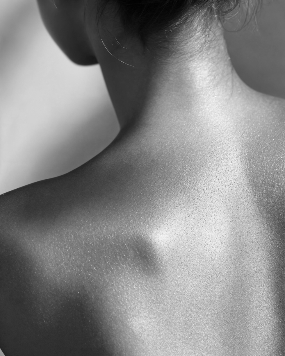 Close-up of smooth men’s skin after facial treatment at Virtue Esthetics