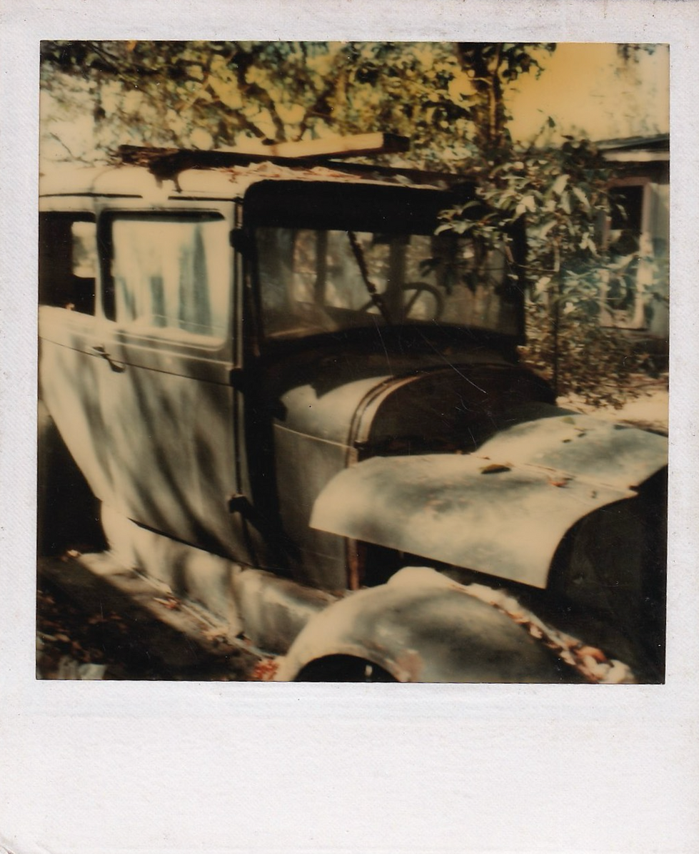 Polaroid Photograph of William Gladden Sr.'s 1920s Ford Model T, front