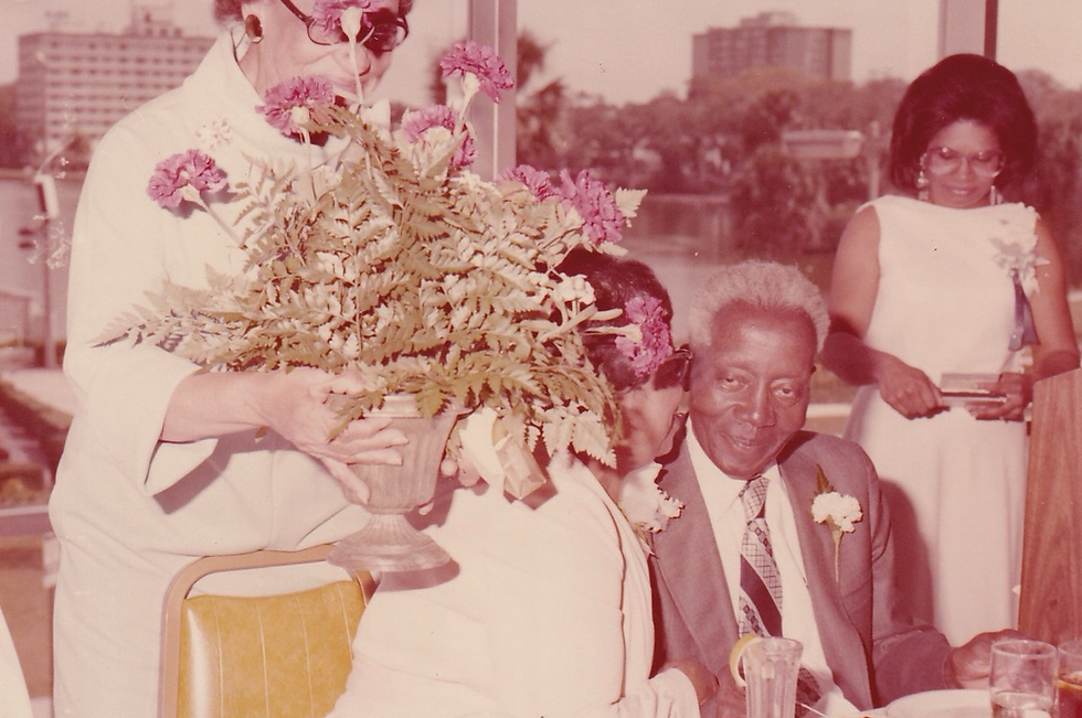 Photograph of Michael Gladden Jr. and Marie Stapler Gladden at her Retirement Ceremony, c. 1970.