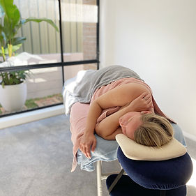 side laying pregnancy massage.jpeg