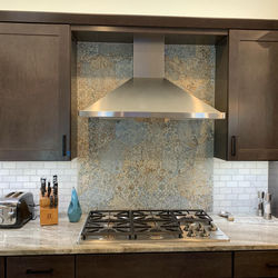 Cooking space with beautiful fresco tile backdrop!