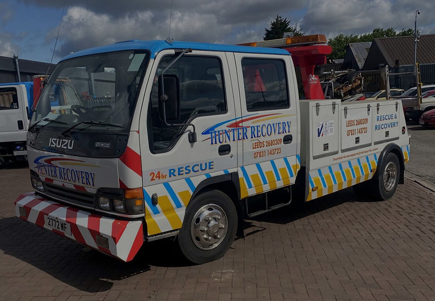 side view of Hunter Recovery recovery truck