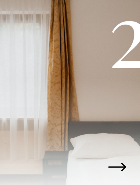 Bett im Appartement vom Central Home Wagrain