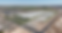 Aerial view of a large industrial complex in a rural setting.