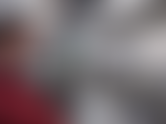 Technician performing air particulate testing in a Florida home using a laser particle counter to measure indoor air quality.