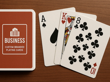 A custom deck of business branded playing cards featuring a company logo, used as a promotional giveaway to boost brand engagement at a corporate event.
