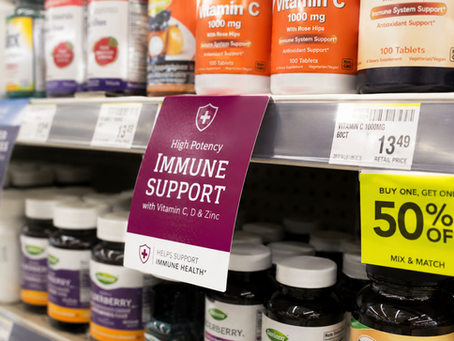 Custom shelf talkers displayed on retail shelves highlighting promotions and product features to increase visibility and drive in-store sales.