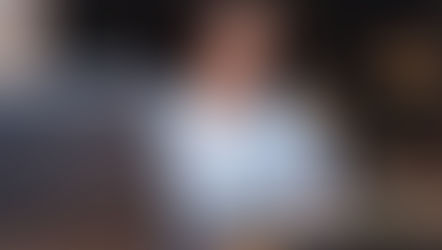 Student studying online for a bachelor’s degree in public health while reviewing health data and coursework on a laptop.