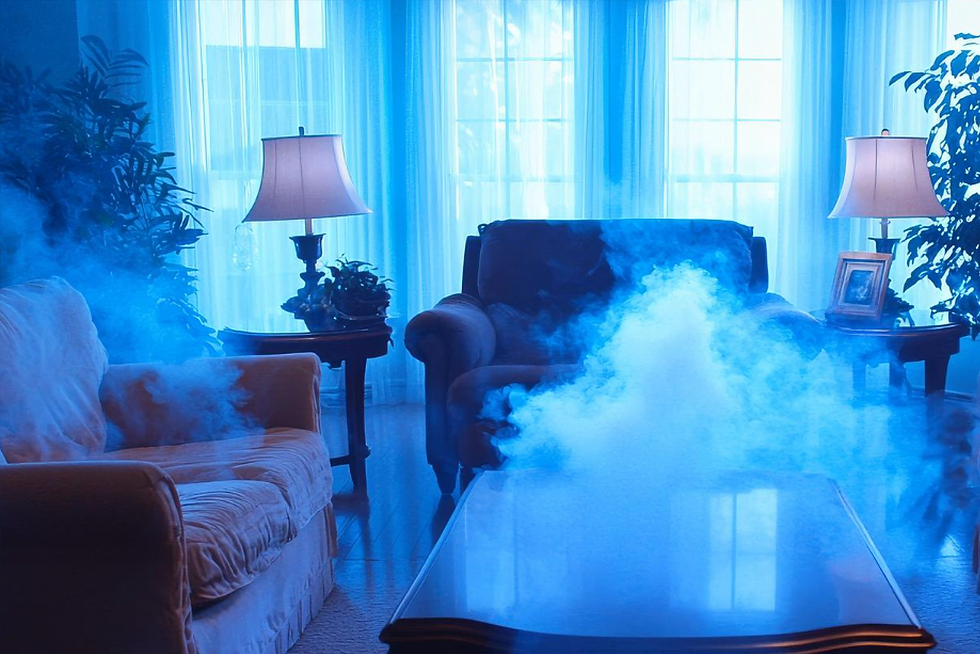 A living room filled with visible blue chemical fumes illustrating indoor air pollution and off gassing symptoms caused by VOCs in Florida homes.