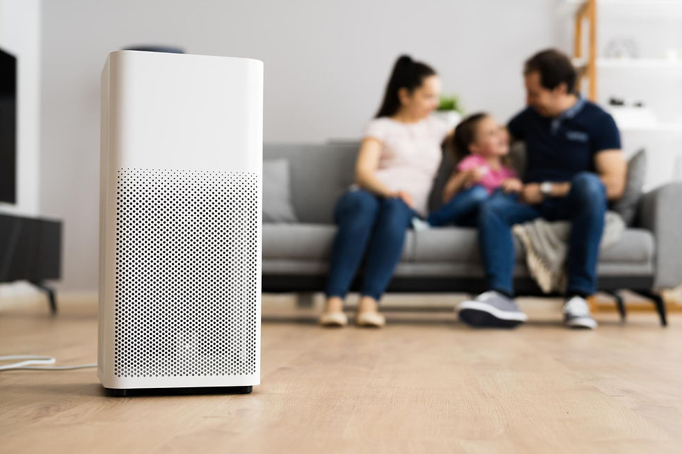 Modern air purifier operating in a family living room, illustrating the question “do air purifiers work” for improving indoor air quality.