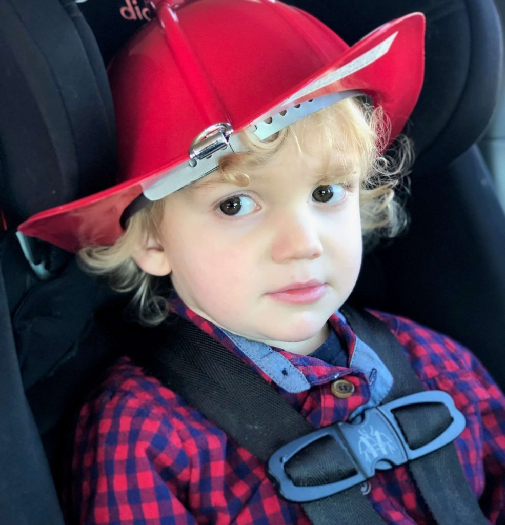 boy in fireman hat