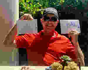 Father's Day Brunch, dad holding his cards at Jasmine Porch in The Sanctuary Hotel