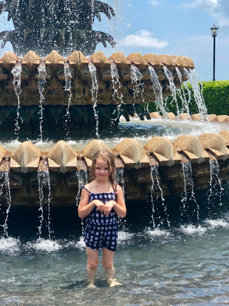 taking a dip in the Pineapple Fountain in Charleston, South Carolina