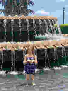 taking a dip in the Pineapple Fountain in Charleston, South Carolina