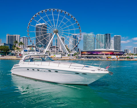 The 55' Sexy Lady, a luxury yacht rental in Miami, features expansive sunbathing areas, a stylish lounge, en-suite cabins, and a high-end sound system. Perfect for celebrations, sunset cruises, and weekend escapes.
