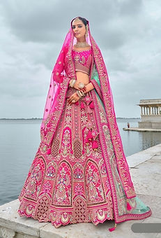 Elegant bridal lehenga in vibrant colors with intricate embroidery for weddings