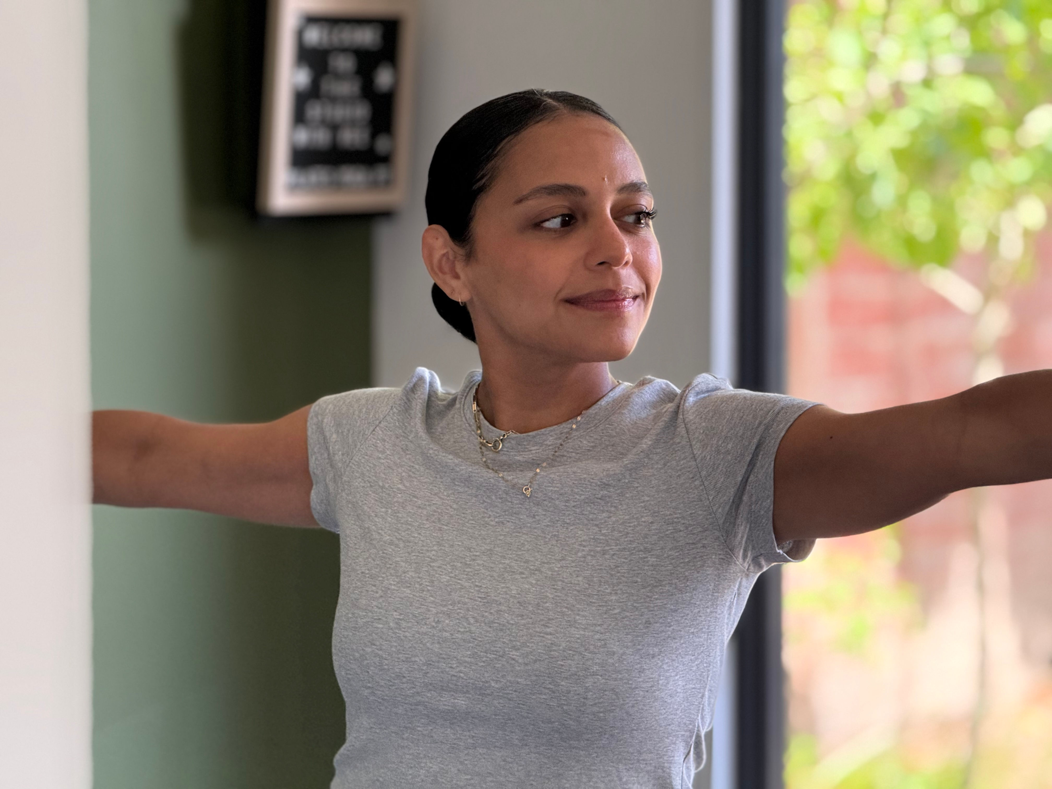 Class participant practicing yoga at The Garden Retreat