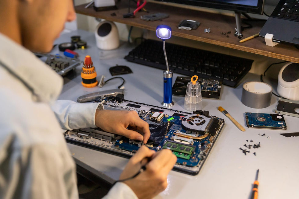 Technician repairing a laptop computer in Omaha, Nebraska