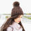 Thumbnail: Knit  Beanie With Finn Raccoon Pom Pom