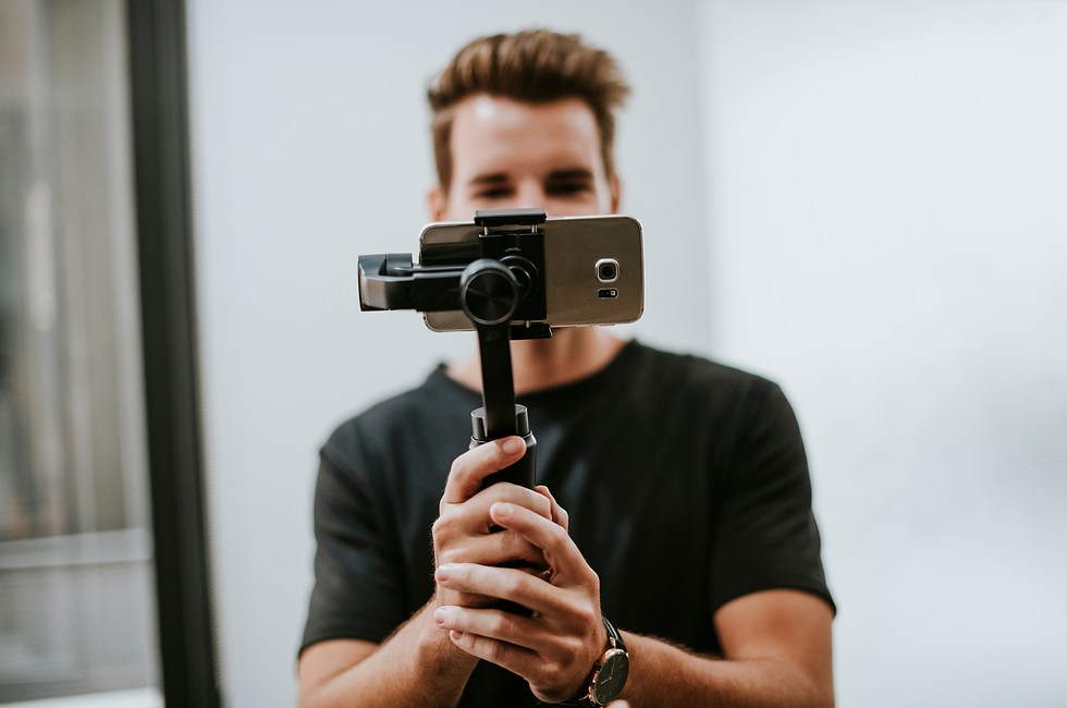 Man holding a gimbal with a phone_edited.png