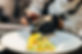 female-chef-placing-orange-slice-dish.jpg