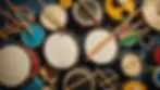 Close-up view of a drum surrounded by colorful percussion instruments