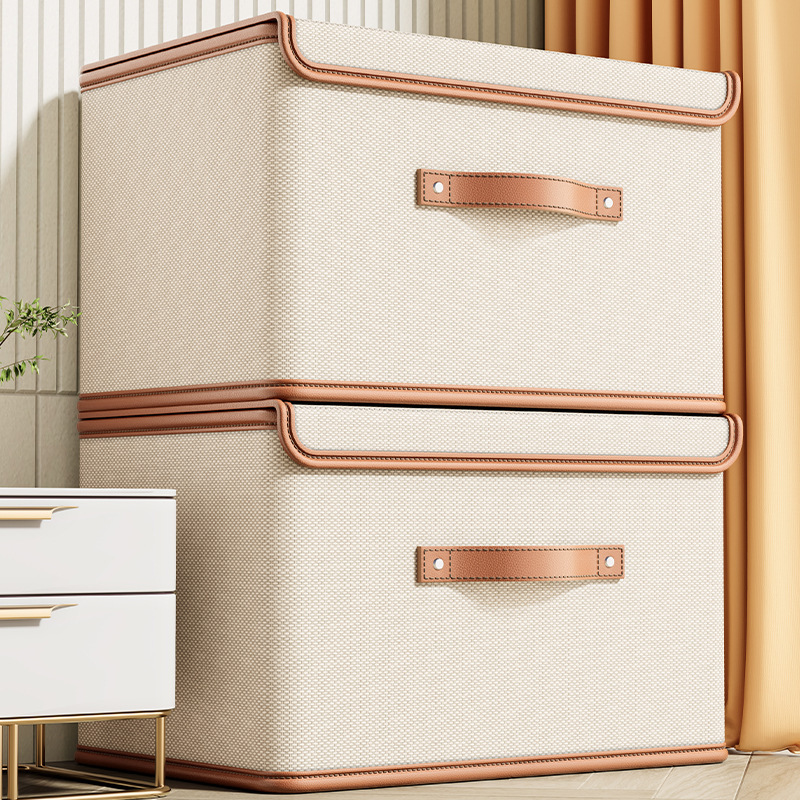 StoreNest Clothes Storage Box with Lid styled in a setting