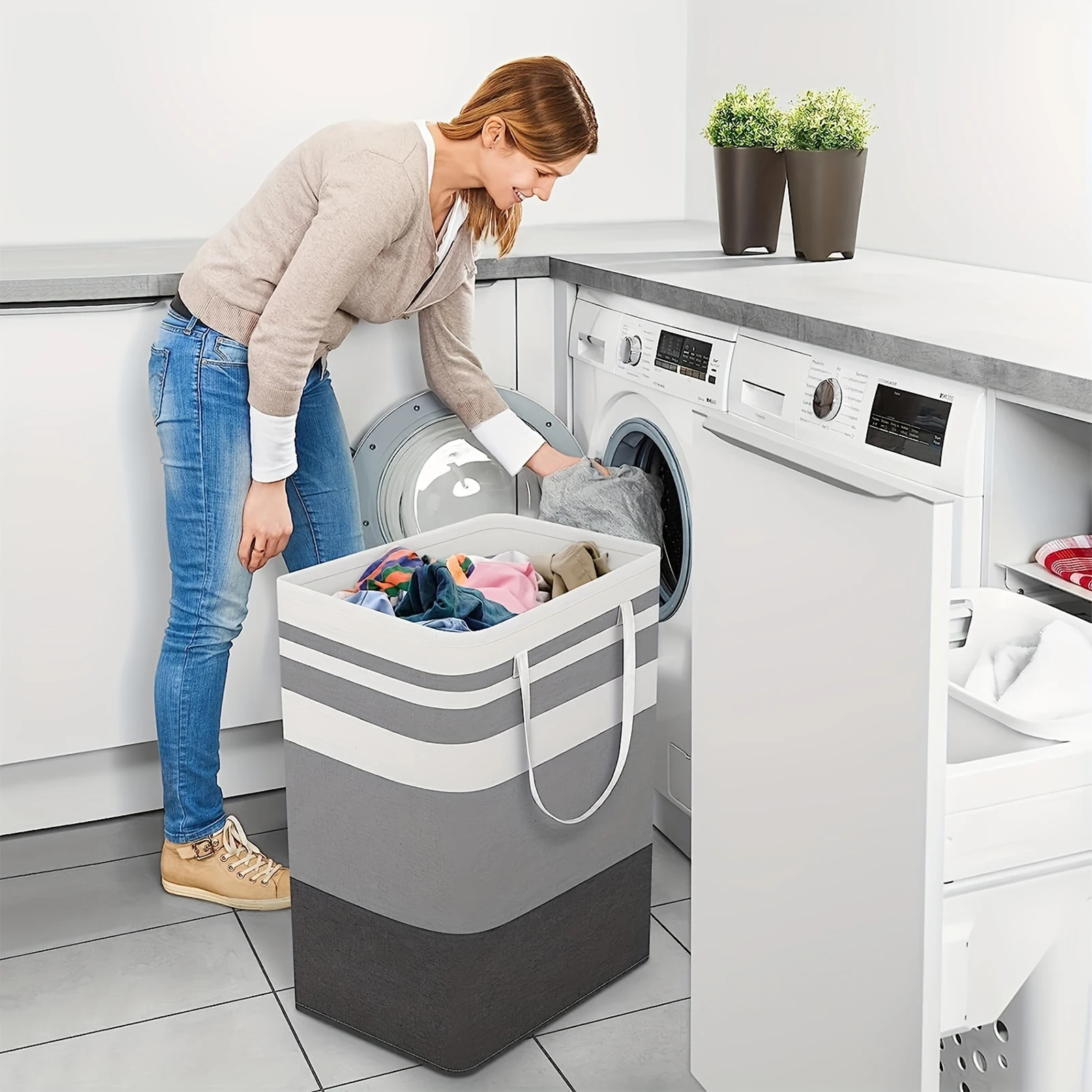FoldNest 75L Large Foldable Clothes Basket with Handless styled in a setting