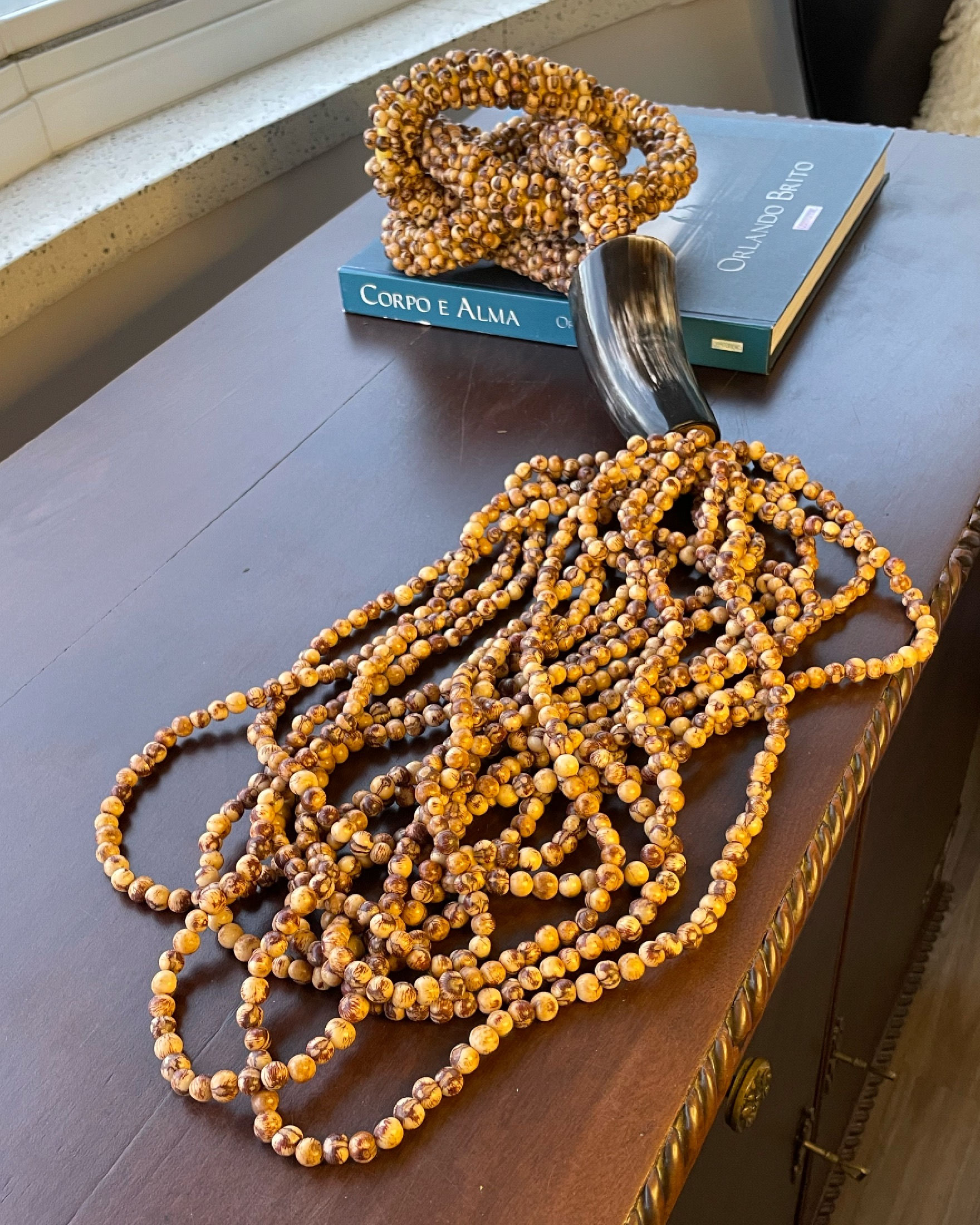 Colar de mesa açaí rústico.