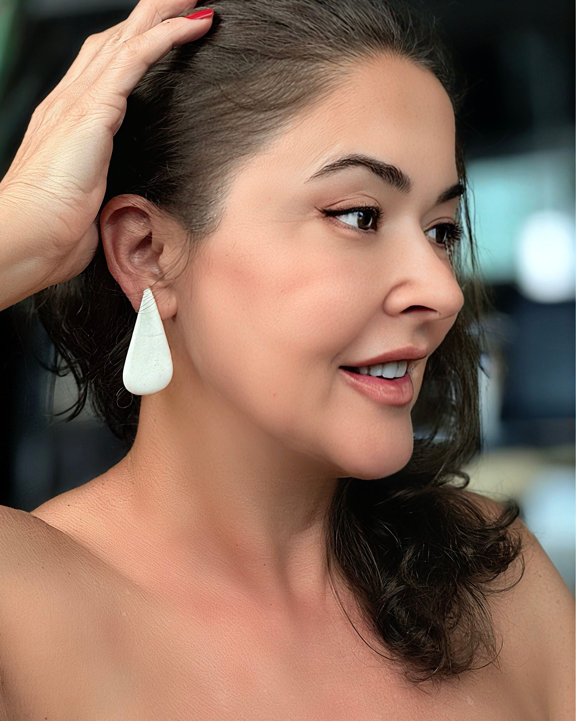 Brincos pirâmide off white M.