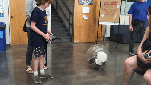 Kid Playing with our Robot on CalDay