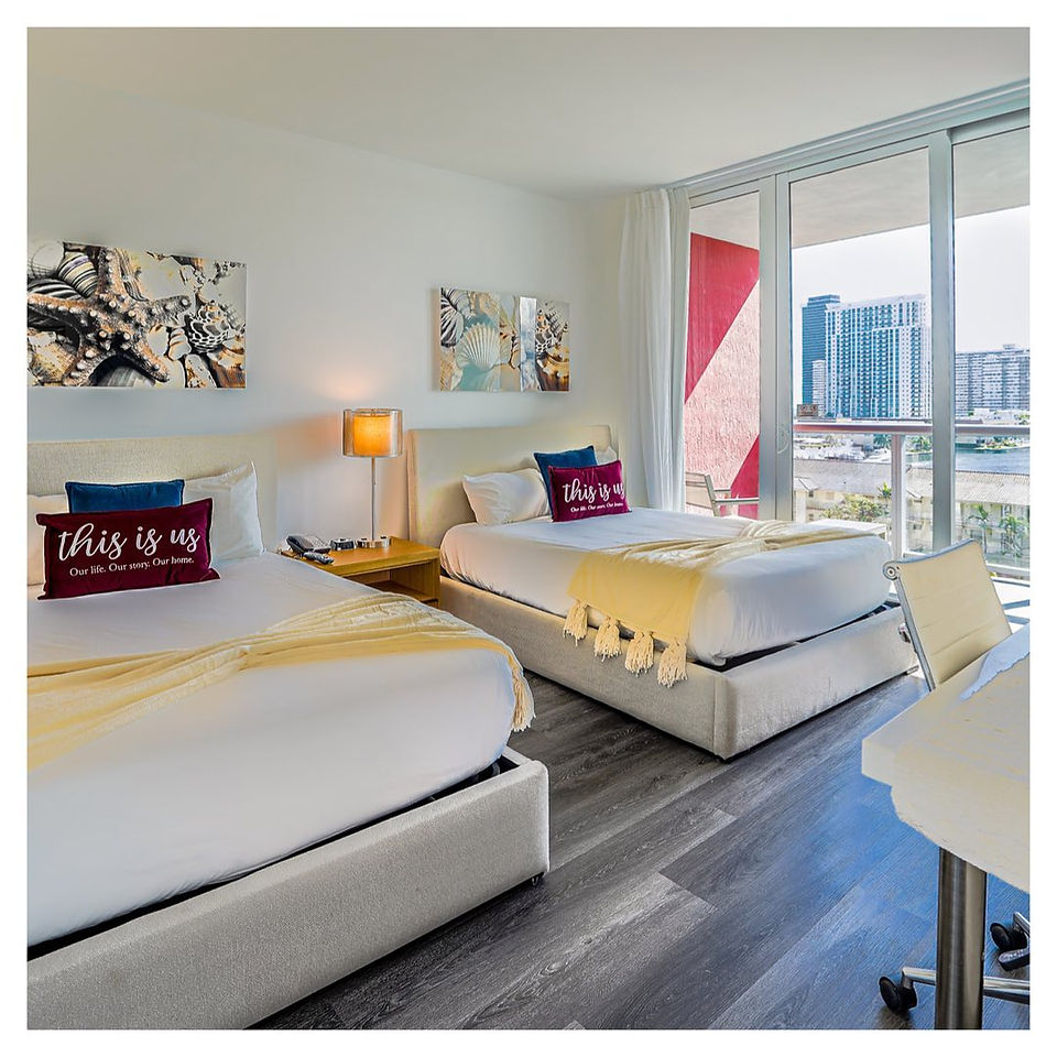 Double bedroom setup to maximize the number of guests per stay, with clean lines and calm tones—made complete with durable, waterproof flooring that elevates the guest experience. Perfect for families or friends traveling together.