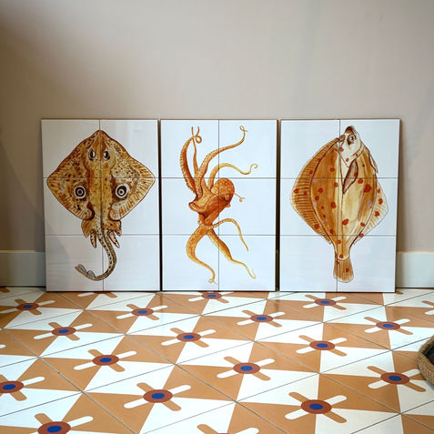 Three hand-painted ceramic tile panels mounted on an MDF board for exhibition