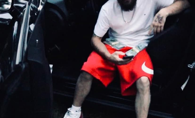 man sitting in a car