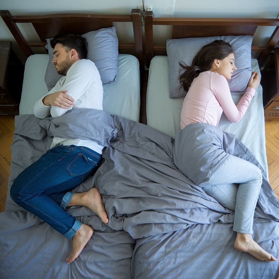 A couple is sleeping facing each other's back. Sleep disorder.
