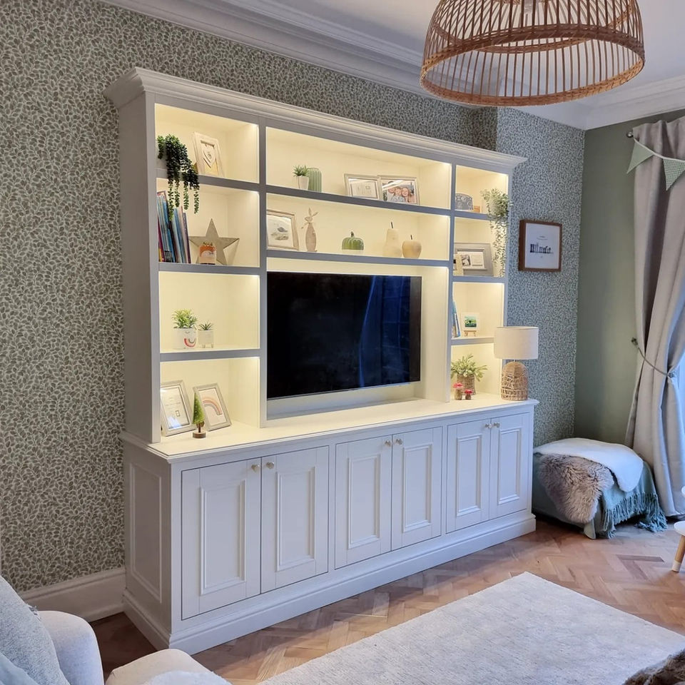 White shaker fitted TV unit fitted in victorian house.
