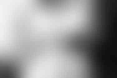 bride exchanges wedding rings photographed in swansea registrars